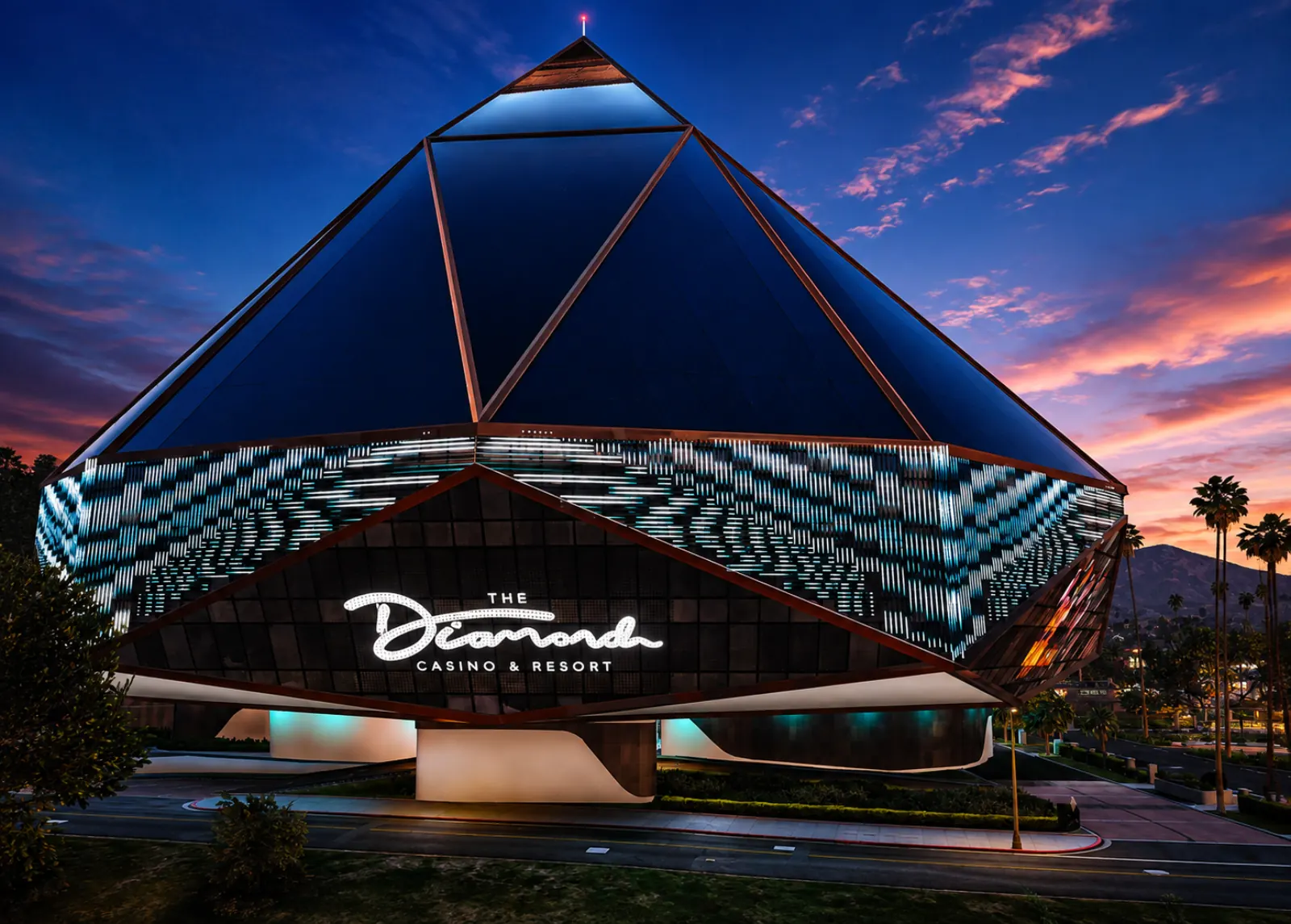 The Diamond resort lit up across the strip